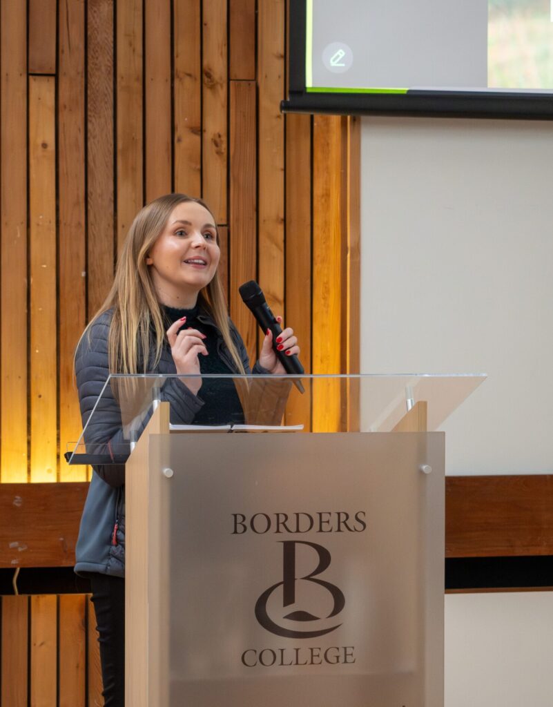 Apithanny Bourne presenting on Merlindale Nature at the 2024 TWIC Conference in Galashiels. Photo by Mike Beard.